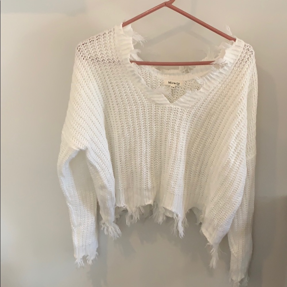 White, slightly cropped, distressed knit sweater